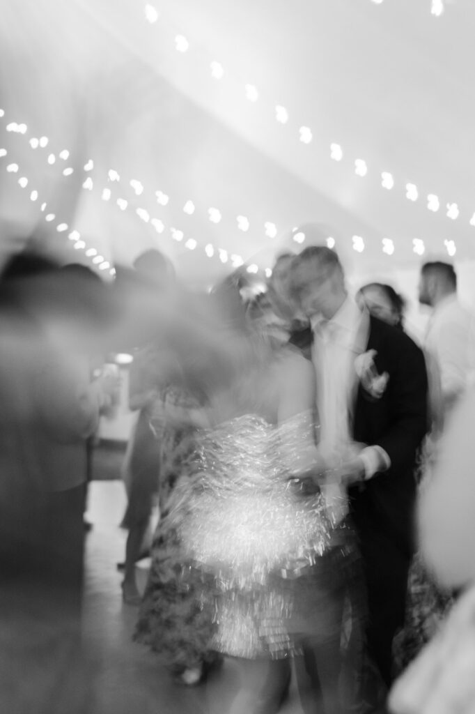 emotive black and white image of a wedding reception