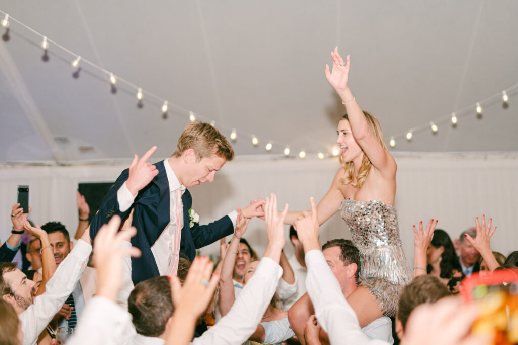 wedding couple celebrating at after-party with guests