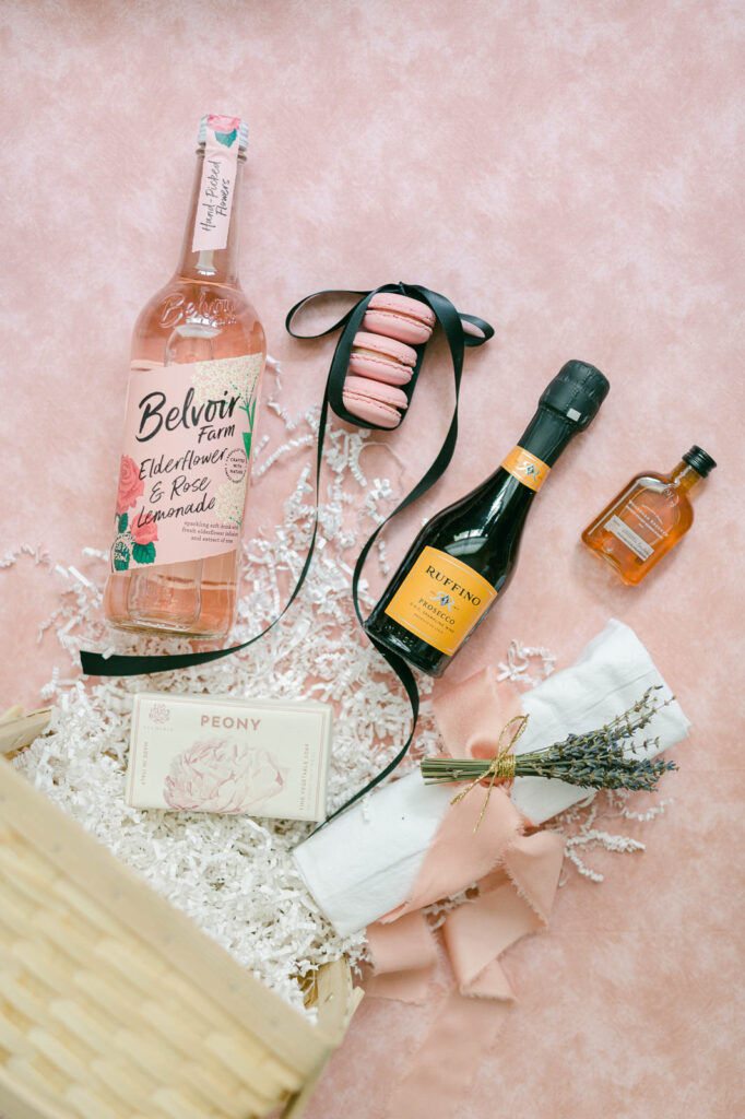 flatlay image of a luxury wedding welcome basket for guests