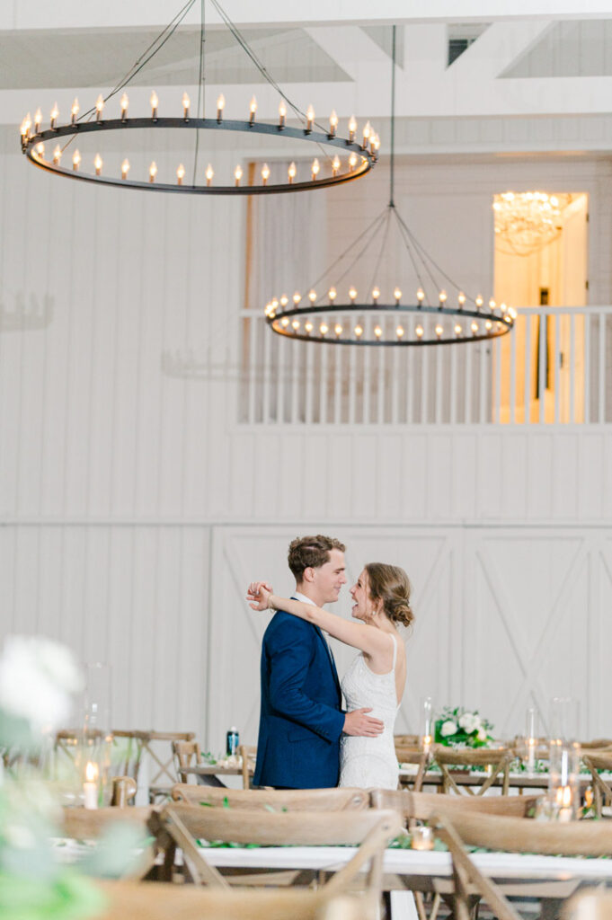 couple dancing at their last dance at the farmhouse in houston